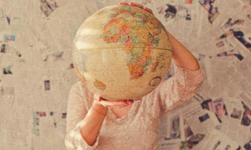 girl-holding-globe-in-hands